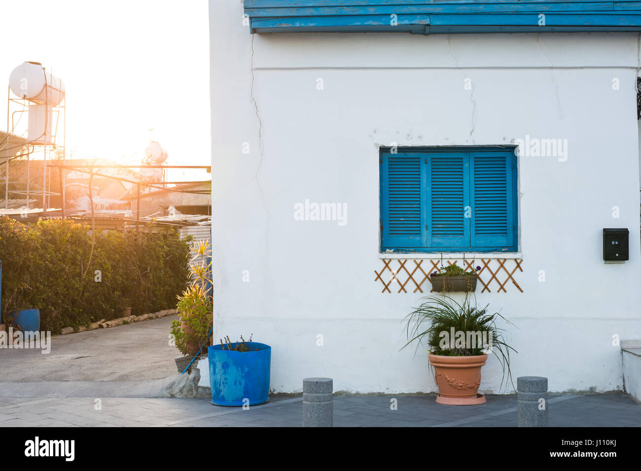 window and flower pot. House facade Stock Photo Alamy