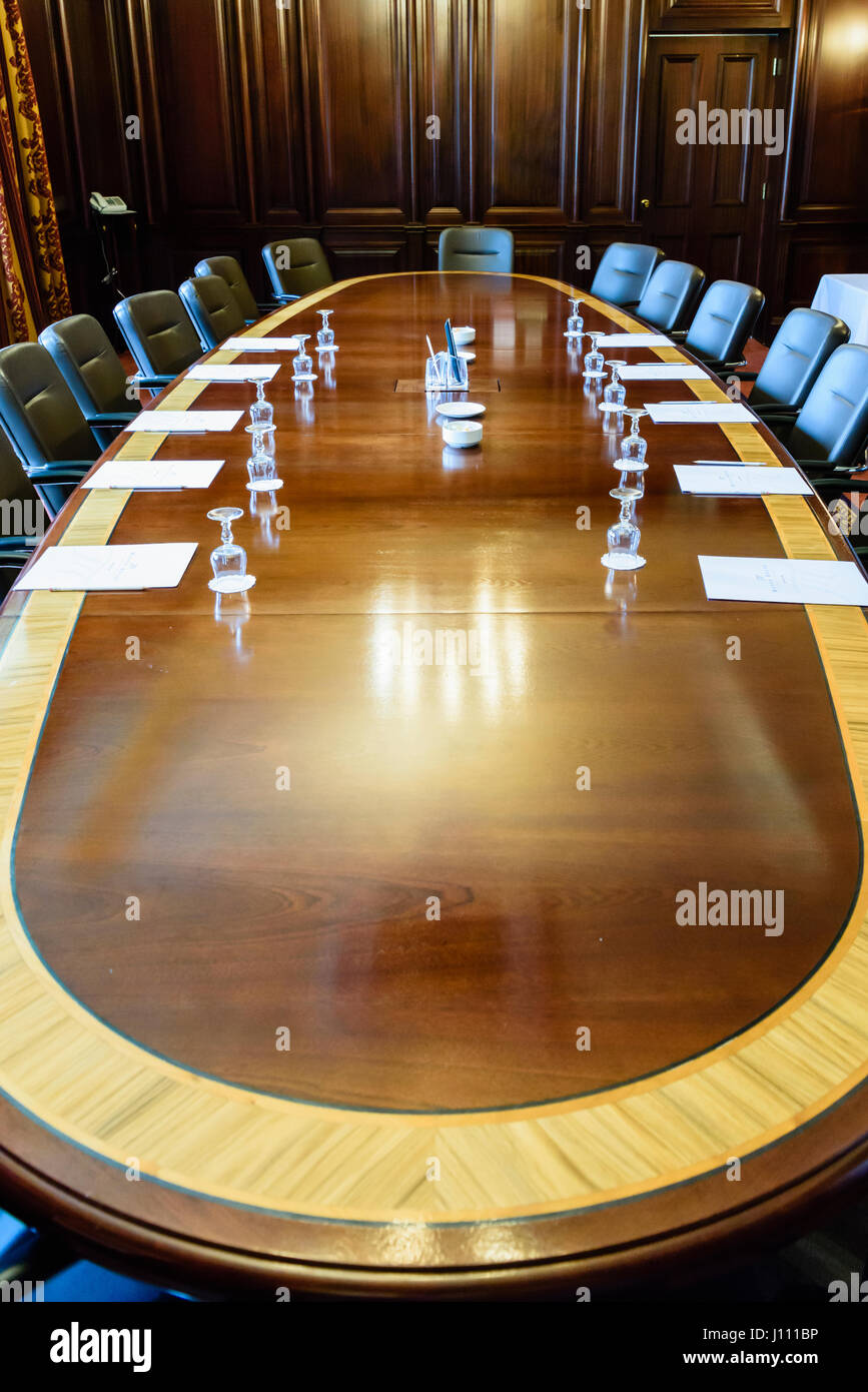 Large Wooden Table In A Board Room With Wood Panelling Set