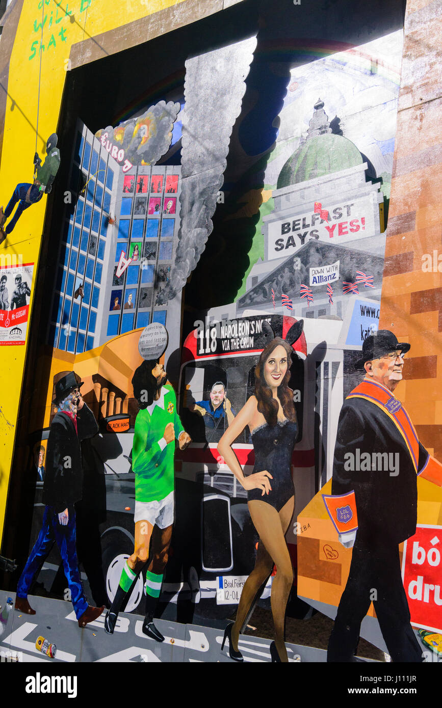 Artistic mural on a wall in Belfast, featuring George Best, an Orangeman, the Europa Hotel being bombed, and Belfast City Hall with 'Belfast Says Yes' Stock Photo