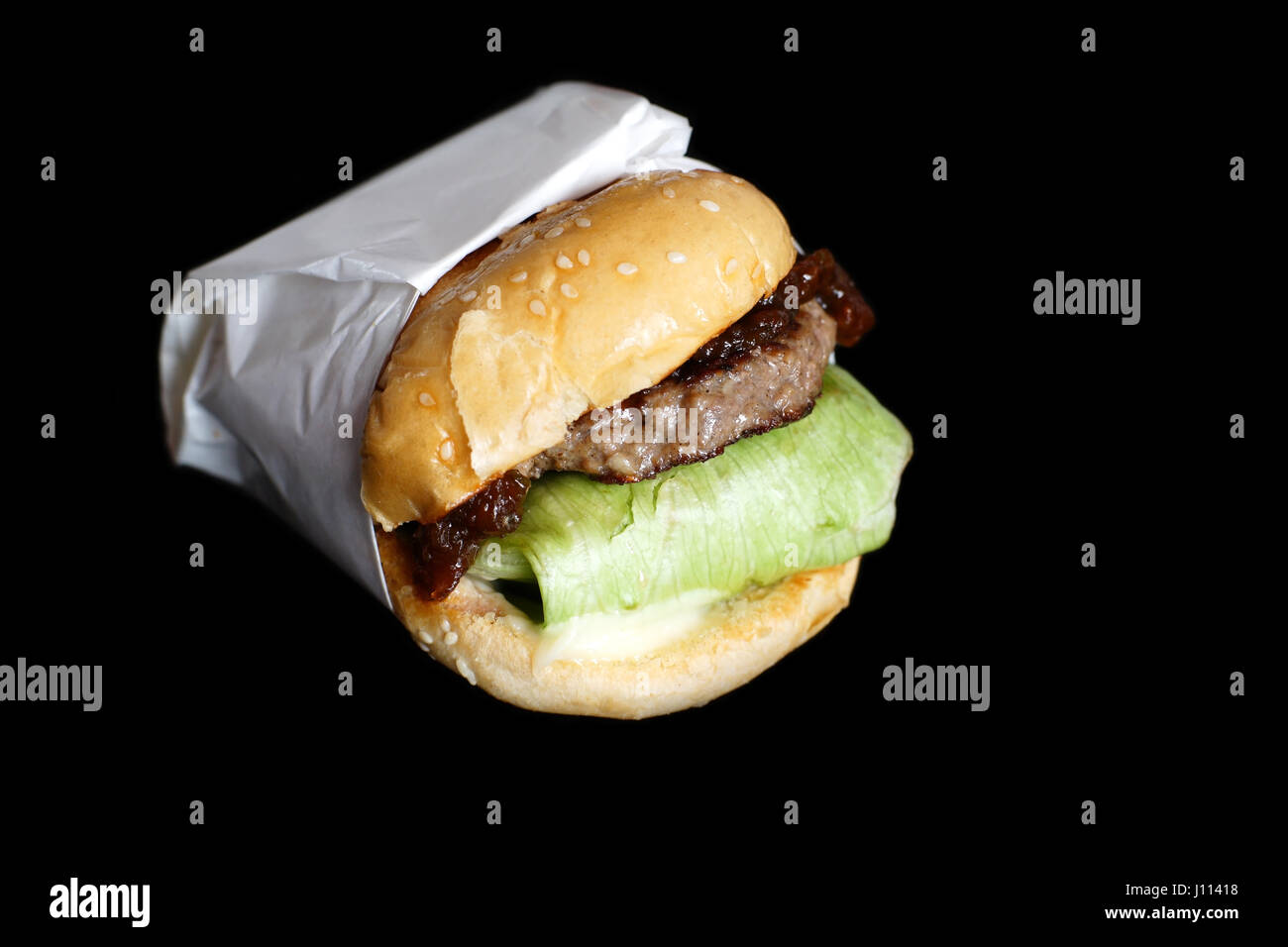 delicious hamburger american fastfood isolated on black background Stock Photo