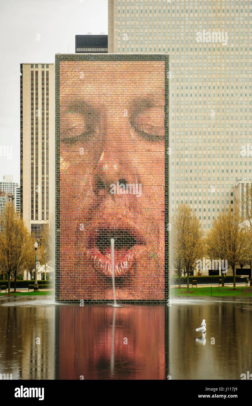 City park, Crown Fountain spouting water on the reflecting pool, Millenium Park, in Chicago, Illinois, USA. Stock Photo