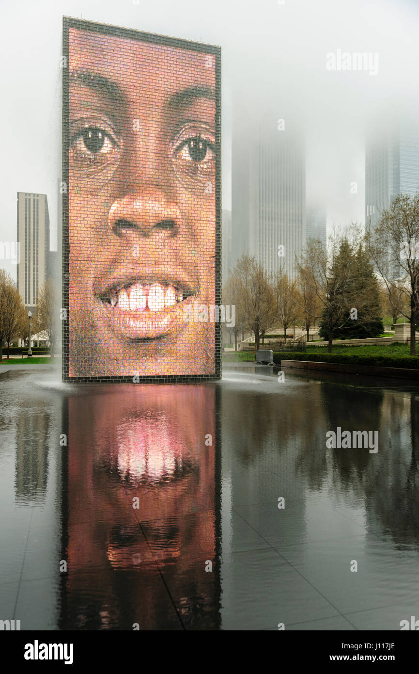Crown Fountain human face reflecting on the pool, overcast skies, Millenium Park, in Chicago