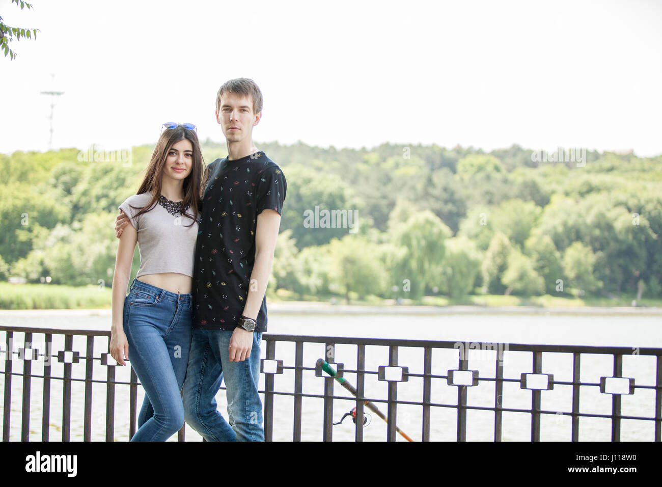 Couple taking a walk in the park Stock Photo - Alamy