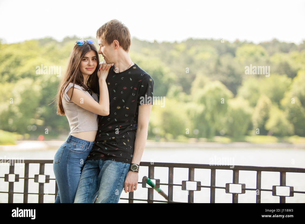 Happy couple in the park Stock Photo - Alamy