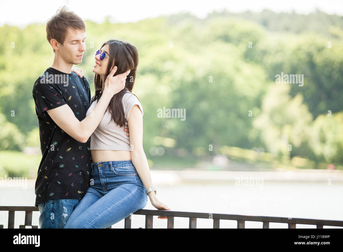 Beautiful couple taking a walk in the park Stock Photo - Alamy