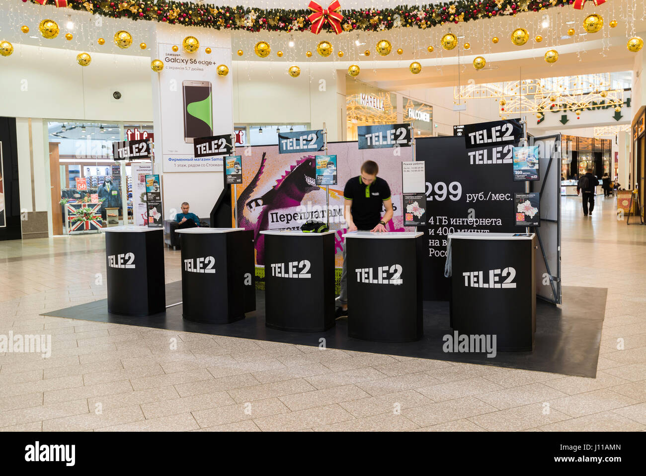 Khimki, Russia - December 22, 2015. The stand of mobile operator Tele2 in  mall Mega Stock Photo - Alamy