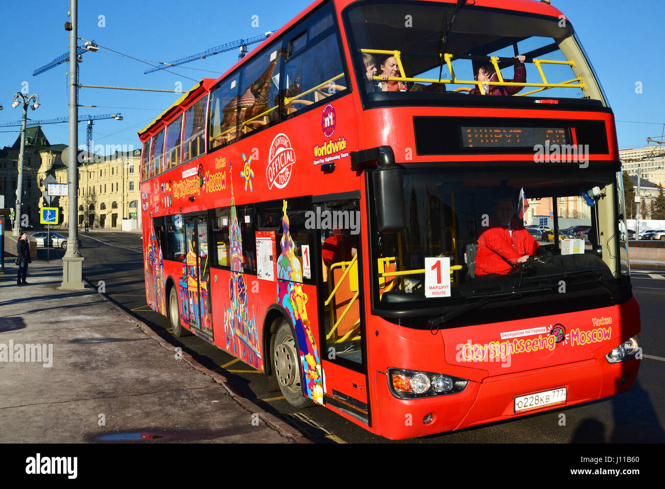 Moscow, Russia -February 18.2016.  two-storey tourist bus City Sightseeing on  street Varvarka Stock Photo