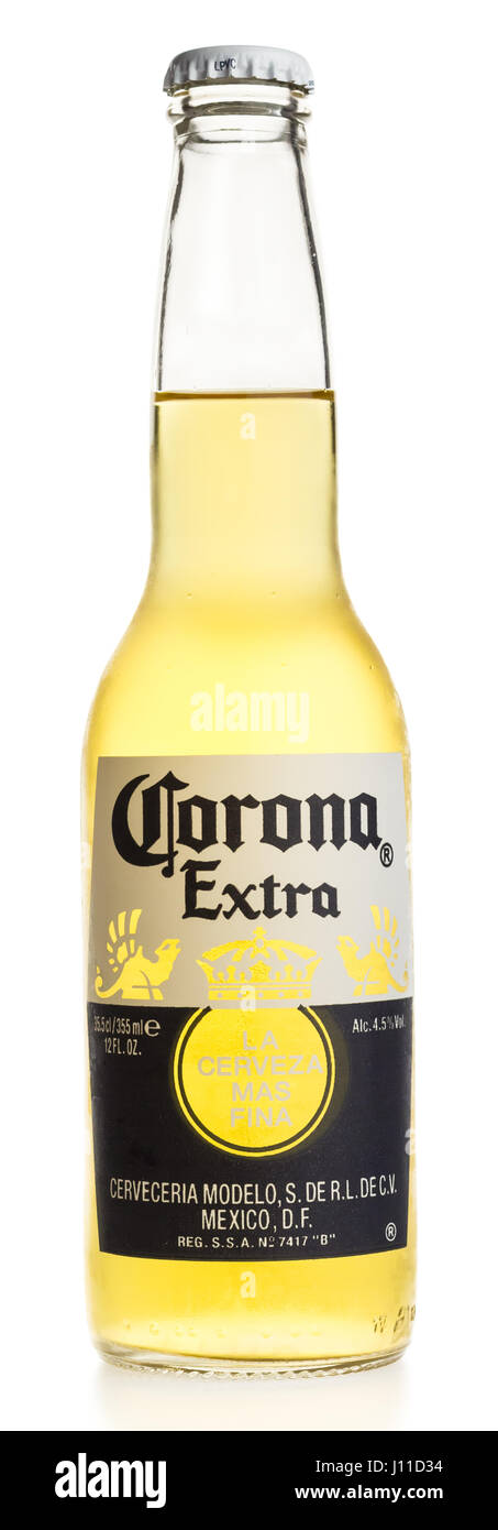 Bottle of Mexican Corona Extra beer isolated on a white background Stock Photo