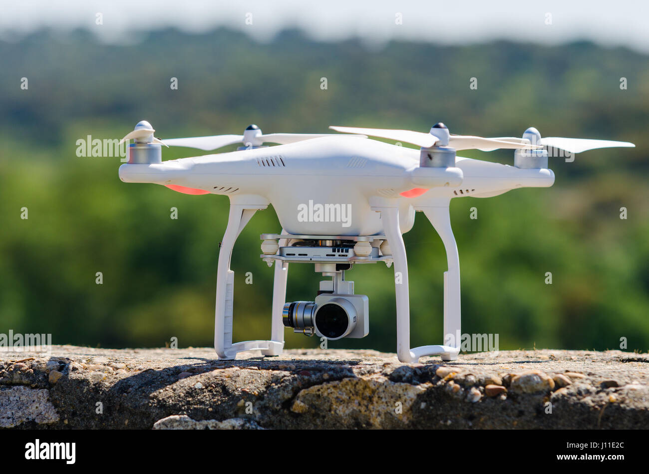 Drone landed on wall Stock Photo -