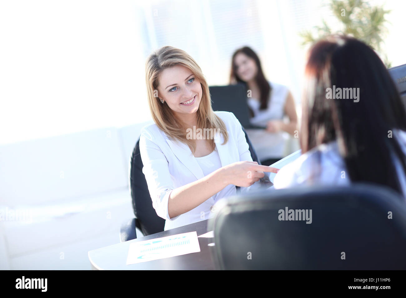 Two Businesswomen Meeting In Office Stock Photo - Alamy