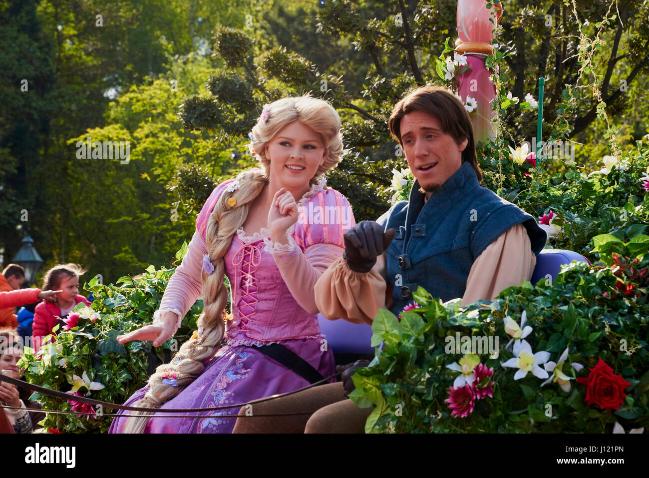 Rapunzel and Flynn on a parade float at the 25th Anniversary of Disneyland Paris Stock Photo