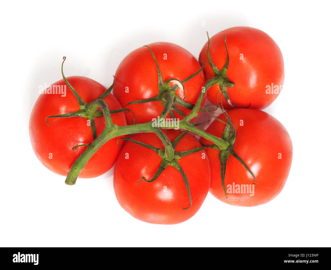 Bunch of red tomatoes isolated on white background Stock Photo - Alamy
