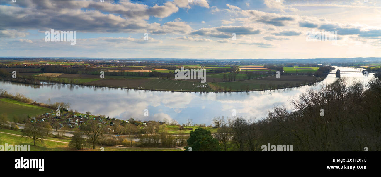 Panaroma at the walhalla with the view to the danube valley in early spring. Reflection from the clouded sky in the river. Stock Photo
