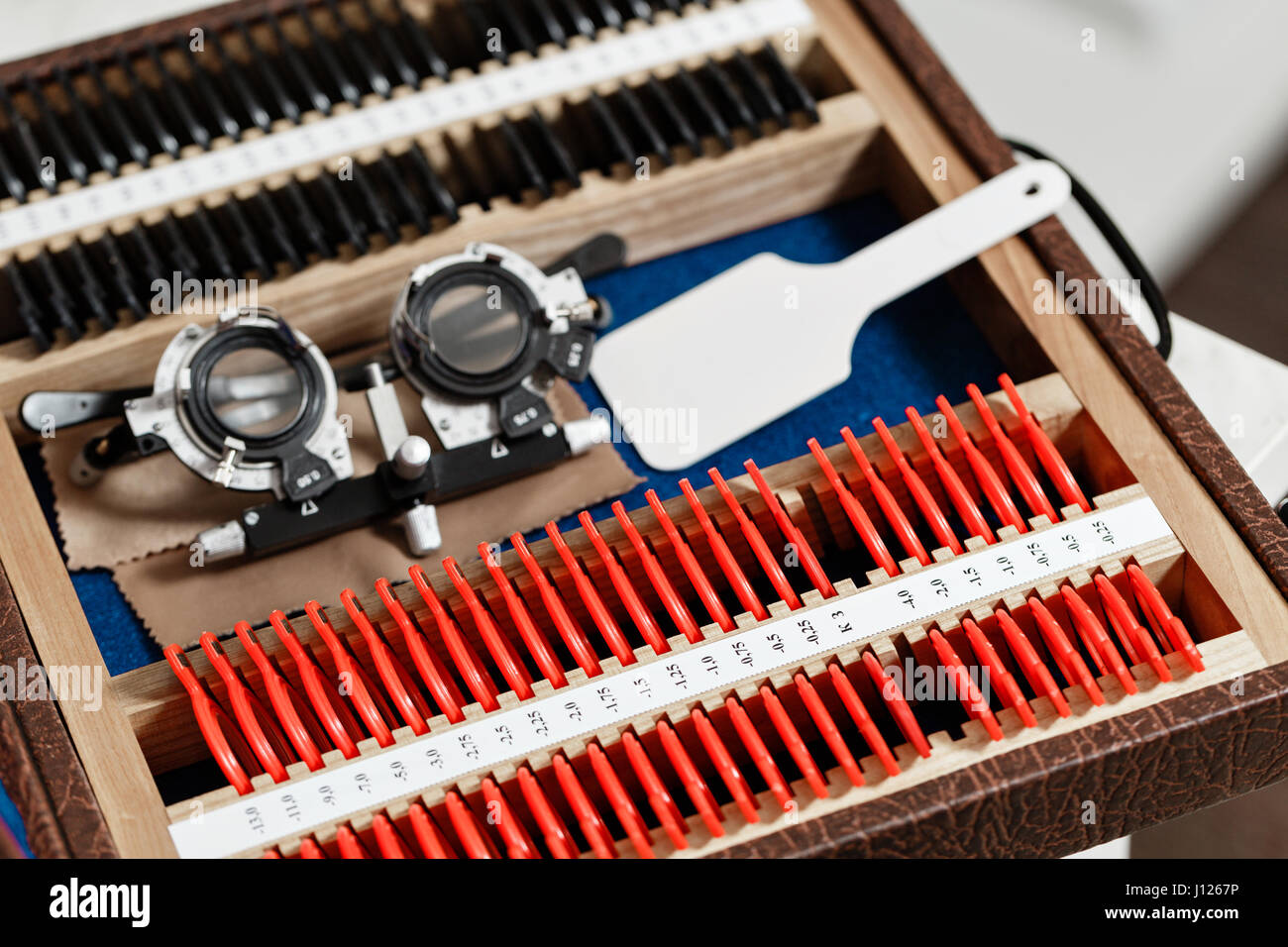 Optometry concept. test glasses phoropter with lens set for eye sight