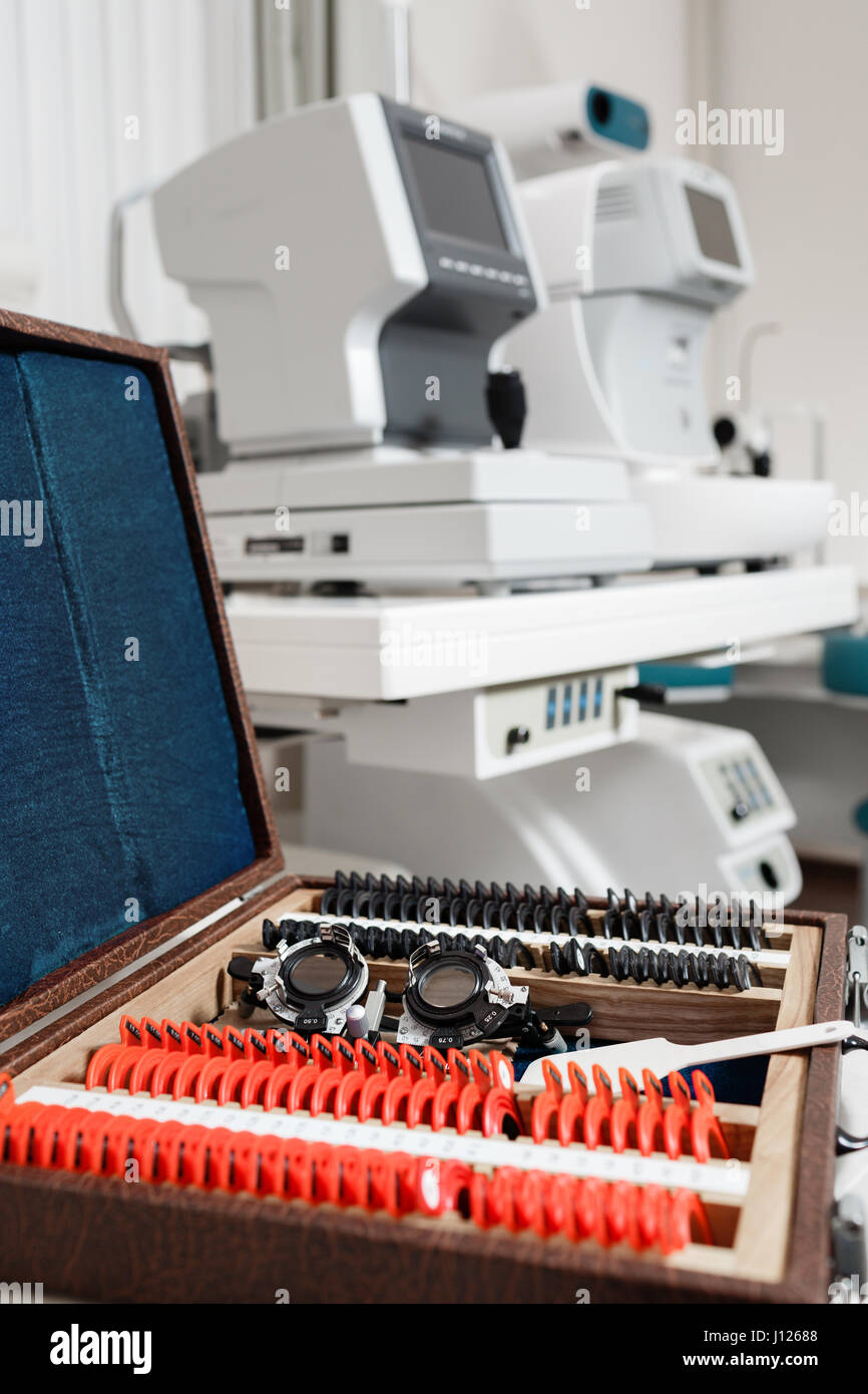 Optometry concept. test glasses phoropter with lens set for eye sight vision testing or examinations in clinic Stock Photo
