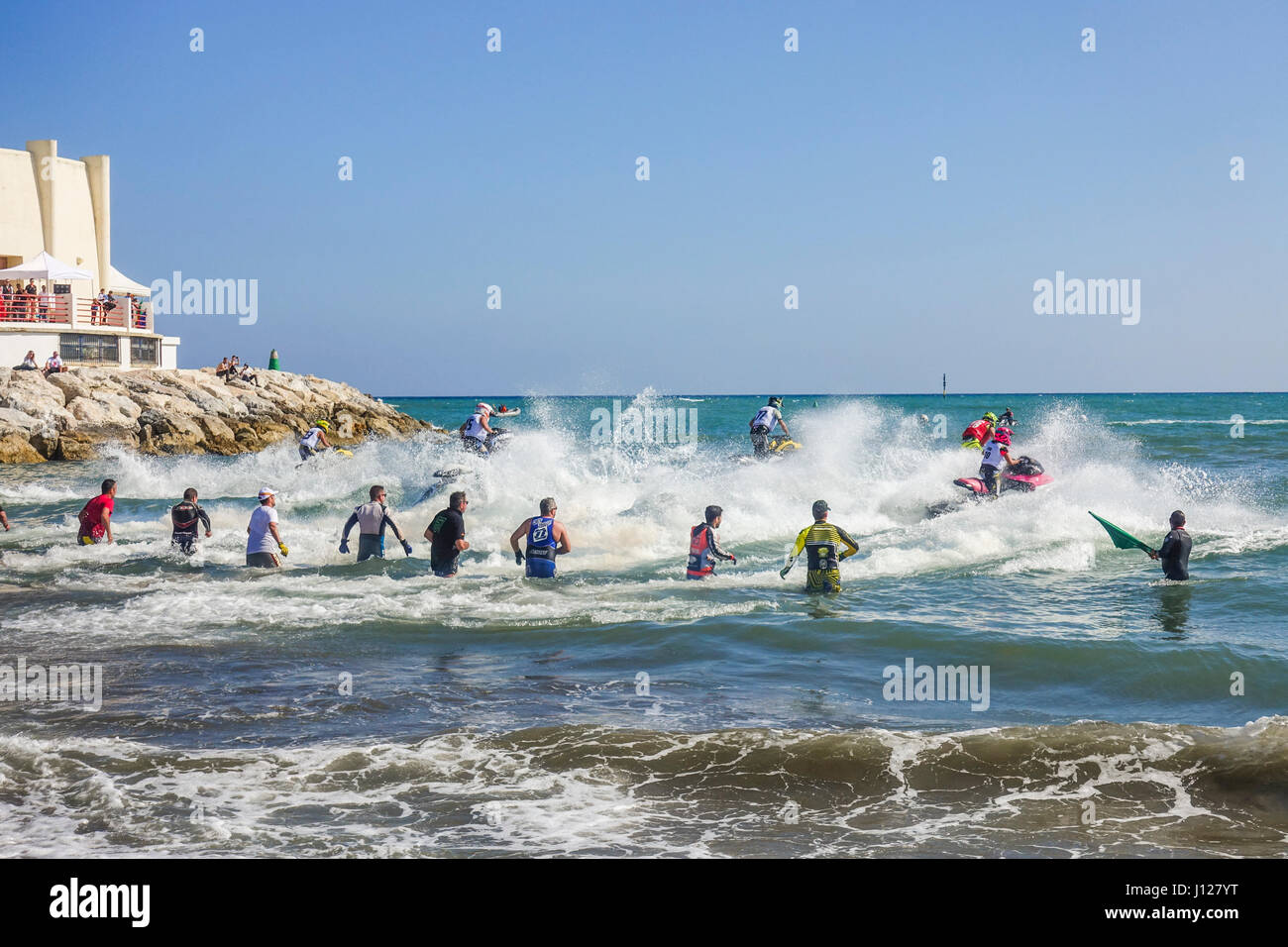 Jet skis waiting at start of race on beach at Spanish Championship april 2017, Jet ski, jetski, Benalmadena, Andalusia, Spain. Stock Photo