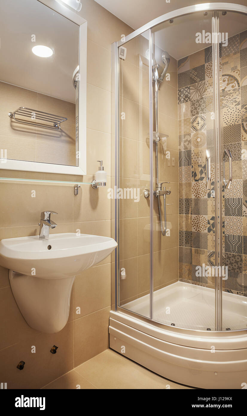 Interior of a small hotel bathroom, modern design. Stock Photo