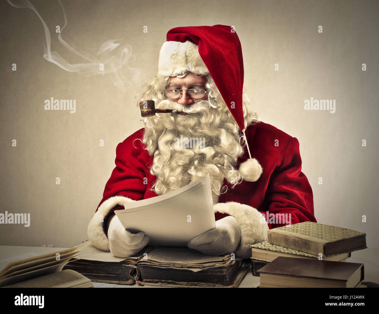 Santa smoking with pipe Stock Photo