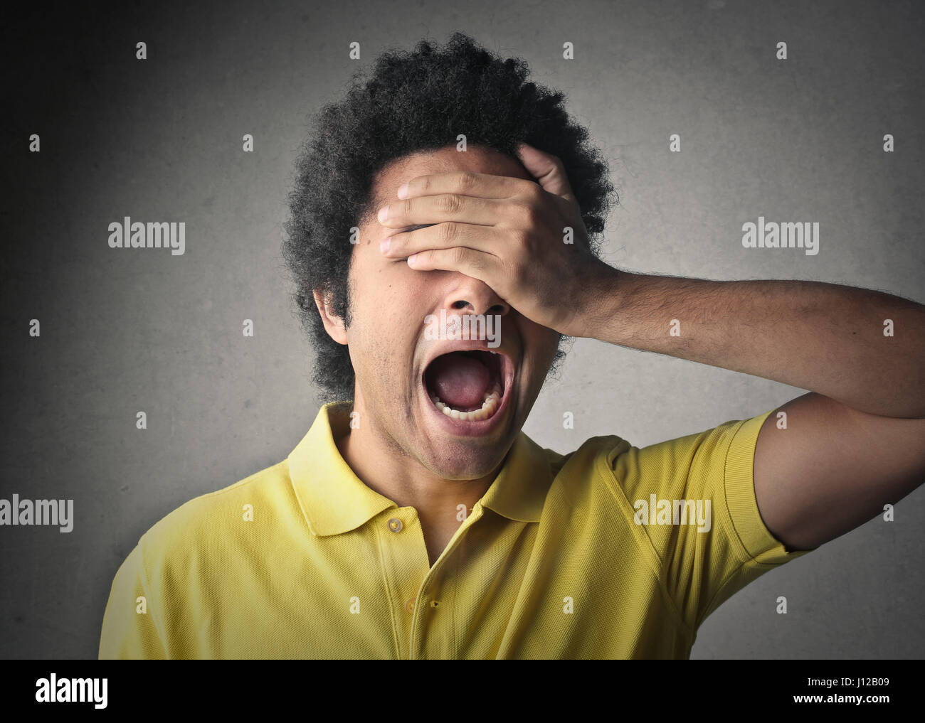 Handsome young man covering eyes hand portrait hi-res stock photography ...