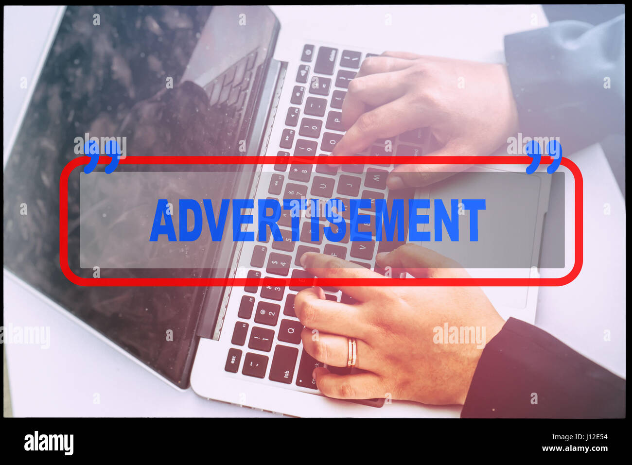 Hand and text "ADVERTISEMENT" with vintage background. Technology ...