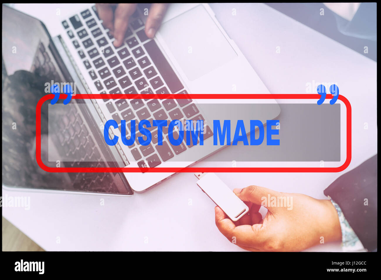 Hand and text "CUSTOM MADE" with vintage background. Technology concept ...