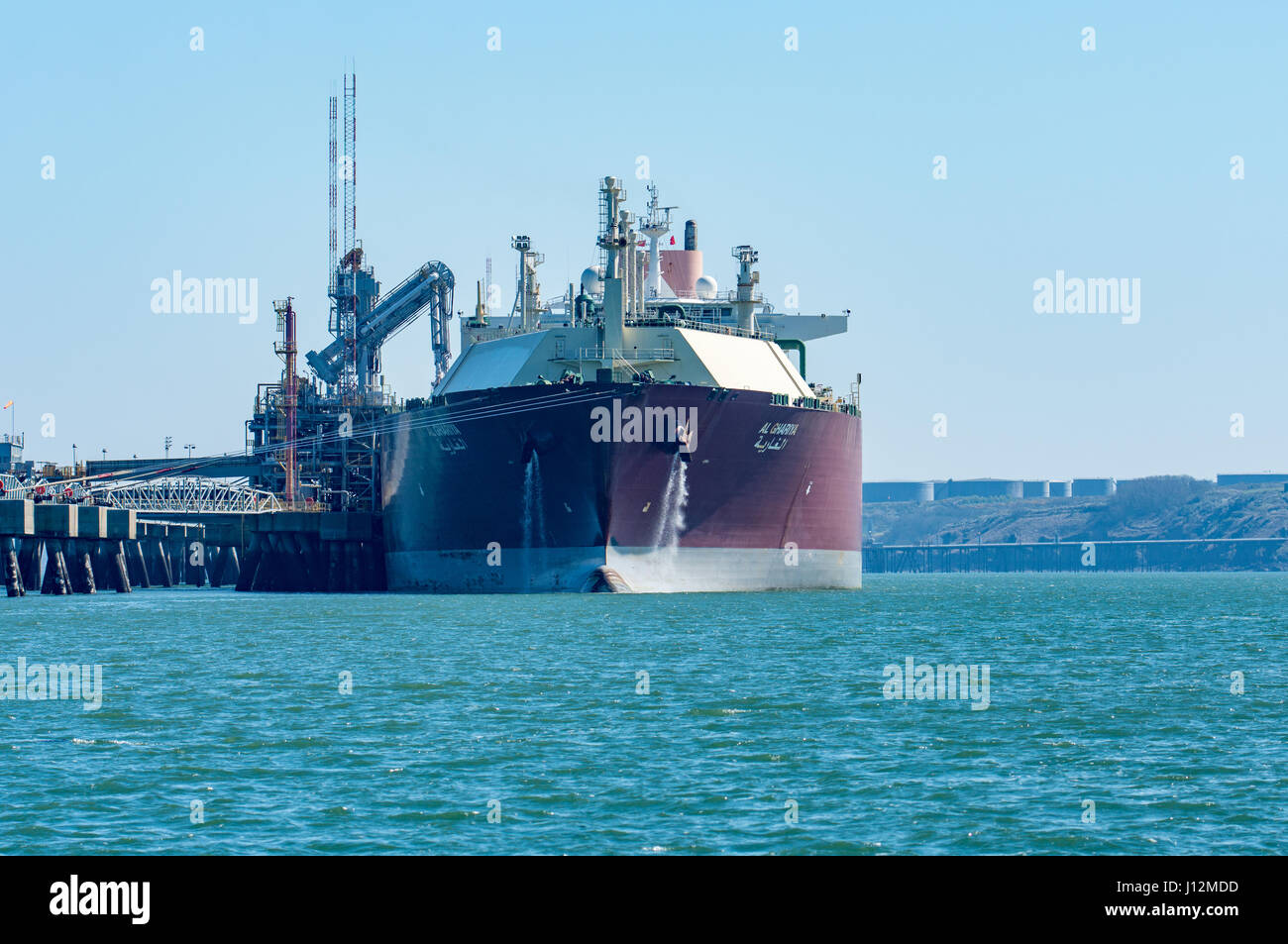 Al Ghariya LNG super tanker unloading at South Hook terminal in Milford Haven Pembrokeshire Stock Photo