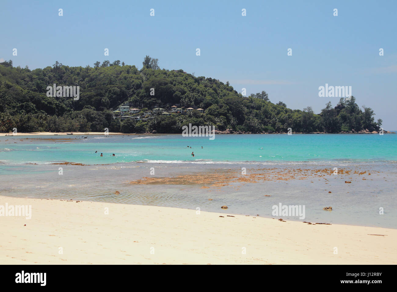 Sandy beach and zone of bathing. Baie Lazare, Mahe, Seychelles Stock Photo