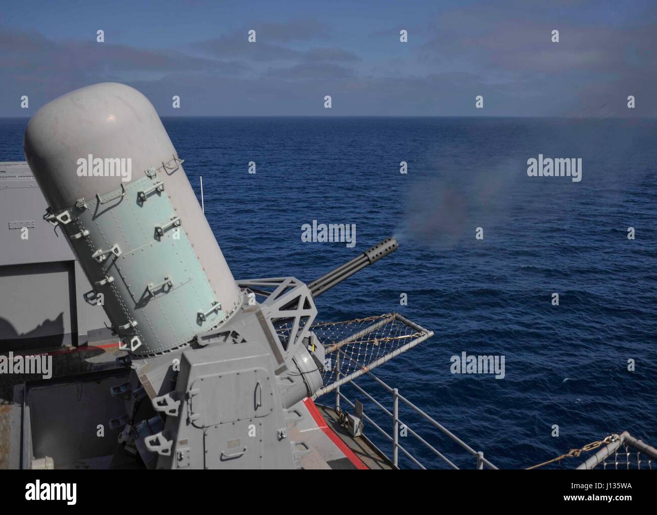 USS Nimitz (CVN 68) fires a Phalanx Close-In Weapons System (CIWS ...