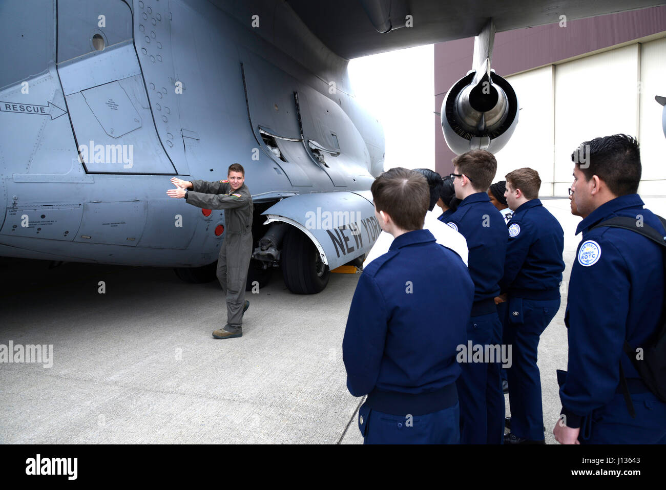 Senior Airman Levi Grant, a loadmaster assigned to the 105th Airlift Wing, gives a tour of the C-17 Globemaster III to cadets from the Newburgh Free Academy Junior Reserve Officer Training program at Stewart Air National Guard Base, New York April 3, 2017. The cadets toured the C-17 and got a demonstration from the aircrew flight equipment section. (U.S. Air Force photo by Staff Sgt. Julio A. Olivencia Jr.) Stock Photo