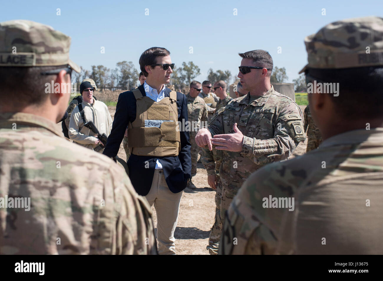 Marine Corps Gen. Joseph F. Dunford Jr., chairman of the Joint Chiefs of Staff, Jared Kushner, Senior Advisor to President Donald J. Trump,Tom Bossert, the president’s homeland security advisor, and Douglas A. Silliman, U.S. Ambassador to the Republic of Iraq, and Lt. Gen. Stephen J. Townsend, commander, Combined Joint Task Force – Operation Inherent Resolve, meet with Service Members at a forward operating base near Qayyarah West in Iraq, April 4, 2017. DoD Photo by Navy Petty Officer 2nd Class Dominique A. Pineiro Stock Photo