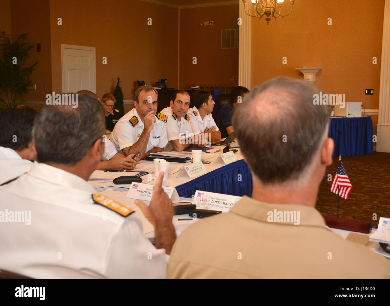 MAYPORT, Fla. (Apr. 04, 2017) – Argentine naval delegation listens to Rear Adm. Luis Mazzeo, left, speak during Maritime Staff Talks between the Argentine and U.S. navies, hosted by Commander, U.S. Naval Forces Southern Command/U.S. 4th Fleet Rear Adm. Sean Buck, right. The MST takes place over the span of three days from Apr. 3-5. (U.S. Navy photo by Mass Communication Specialist 2nd Class Michael Hendricks/Released) Stock Photo