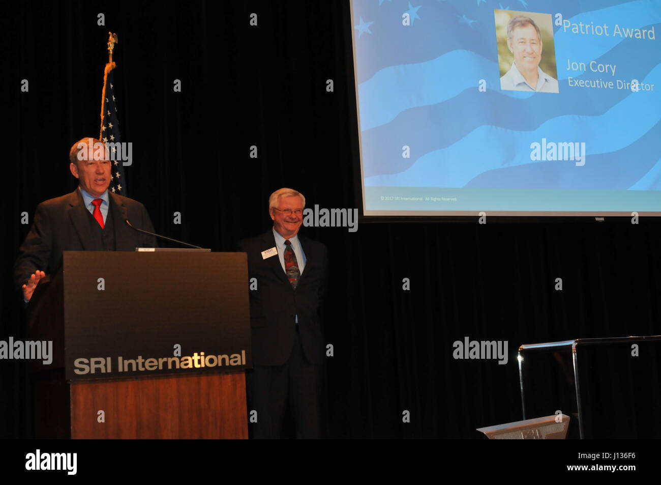 An individual receives the Patriot Award from Employer Support of the ...