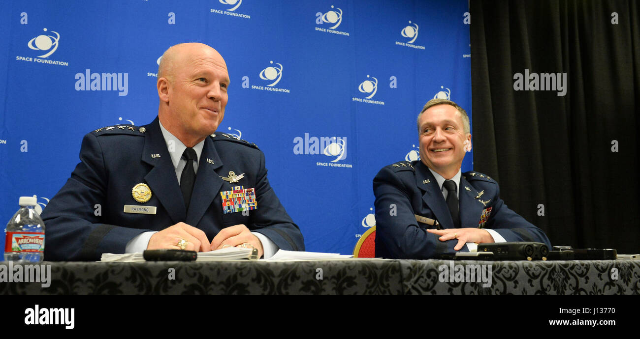 From left, U.S. Air Force Gen. John 'Jay' Raymond, commander, Air Force Space Command, and Lt. Gen. David Buck, commander, 14th Air Force and Joint Functional Component Command for Space, answer questions from reporters in Colorado Springs, Colo., April 6, 2017.  The two discusssed various topics concerning current and future Air Force space operations at the 33rd Space Symposium. (U.S. Air Force photo/Dave Grim) Stock Photo