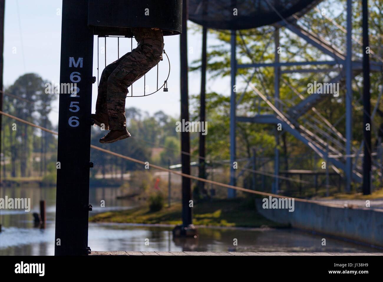 A U.S. Army Ranger climbs a ladder during the Best Ranger Competition ...