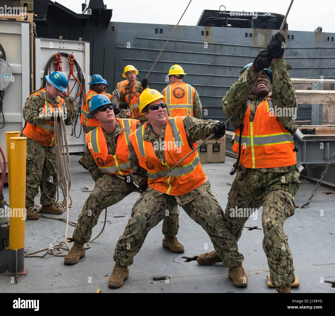 170409-N-OU129-109 POHANG, Republic of Korea (Apr. 9, 2017) Sailors from Navy Cargo Handling Battalion One unload an intermediate module from Navy Maritime Prepositioning Force Ship USNS Pililaau (T-AK 304) using Improved Navy Lighterage System (INLS) off the coast of Pohang, Republic of Korea during Combined Joint Logistics Over the Shore (CJLOTS) April 9. CJLOTS is a biennial exercise conducted by military and civilian personnel from the United States and the Republic of Korea, training to deliver and redeploy military cargo as a part of the large Foal Eagle 2017 exercise. (U.S. Navy photo b Stock Photo
