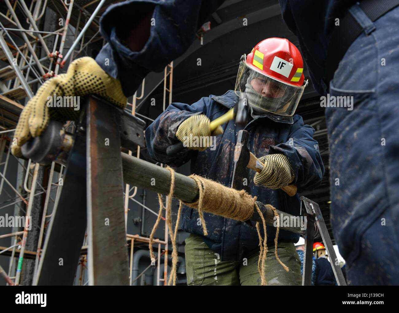 Patching Crew A Seaman performs pipe-patching training on USS Ronald Reagan’s ...
