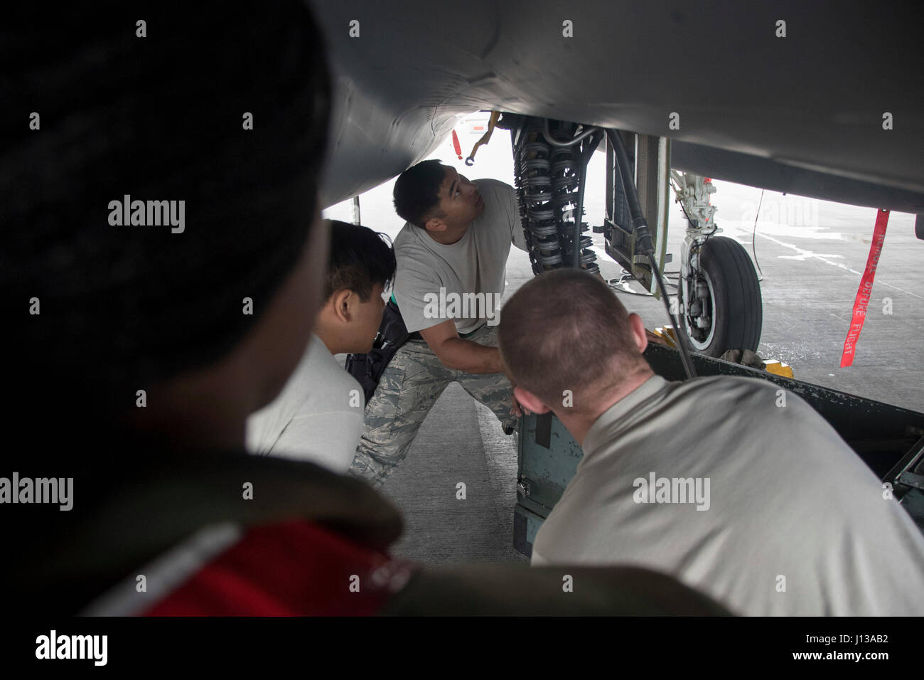 Airmen from the 44th Aircraft Maintenance Unit loaded munitions onto an ...