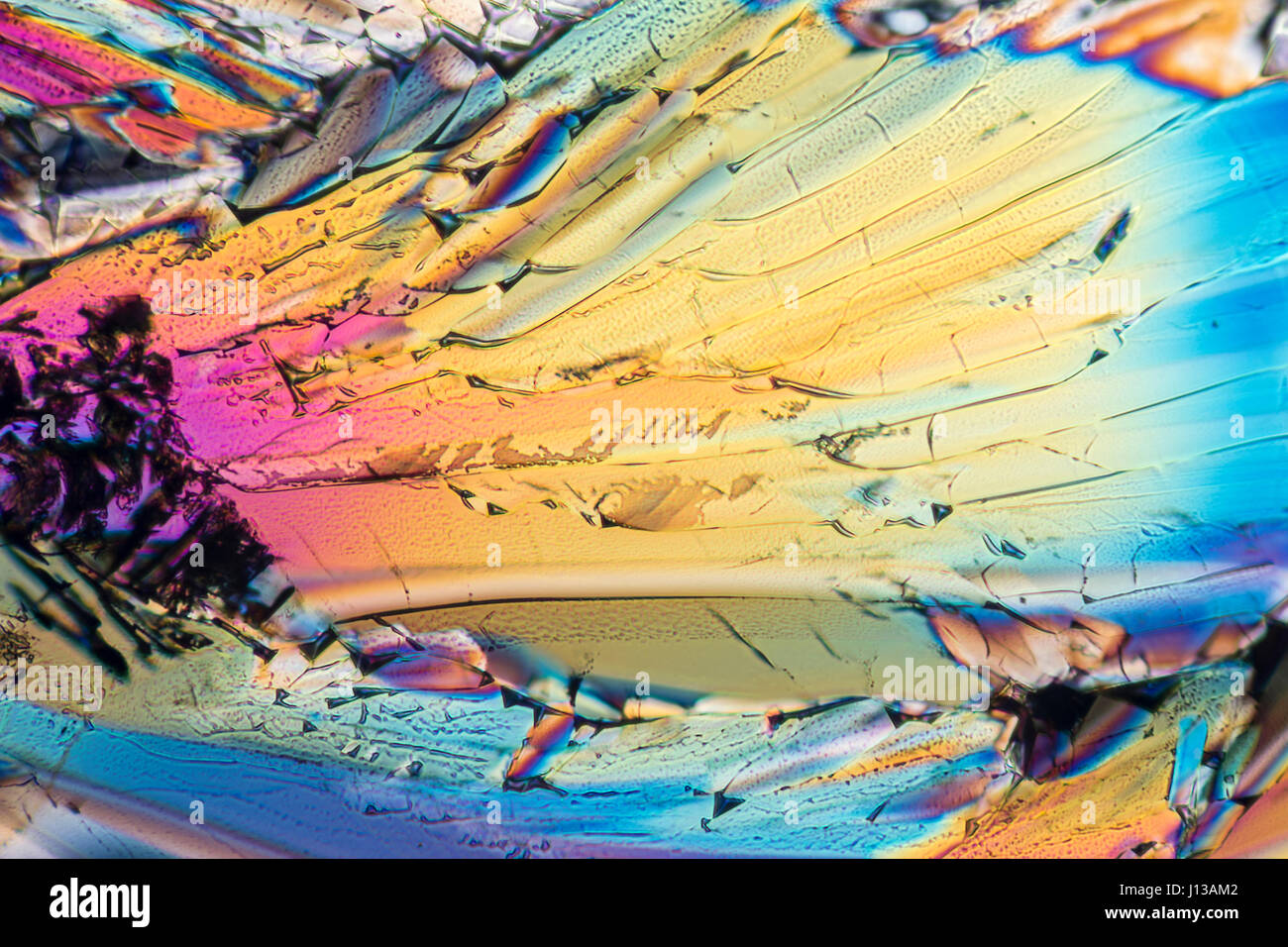 colorful micro crystals of liqueur in polarized light Stock Photo - Alamy