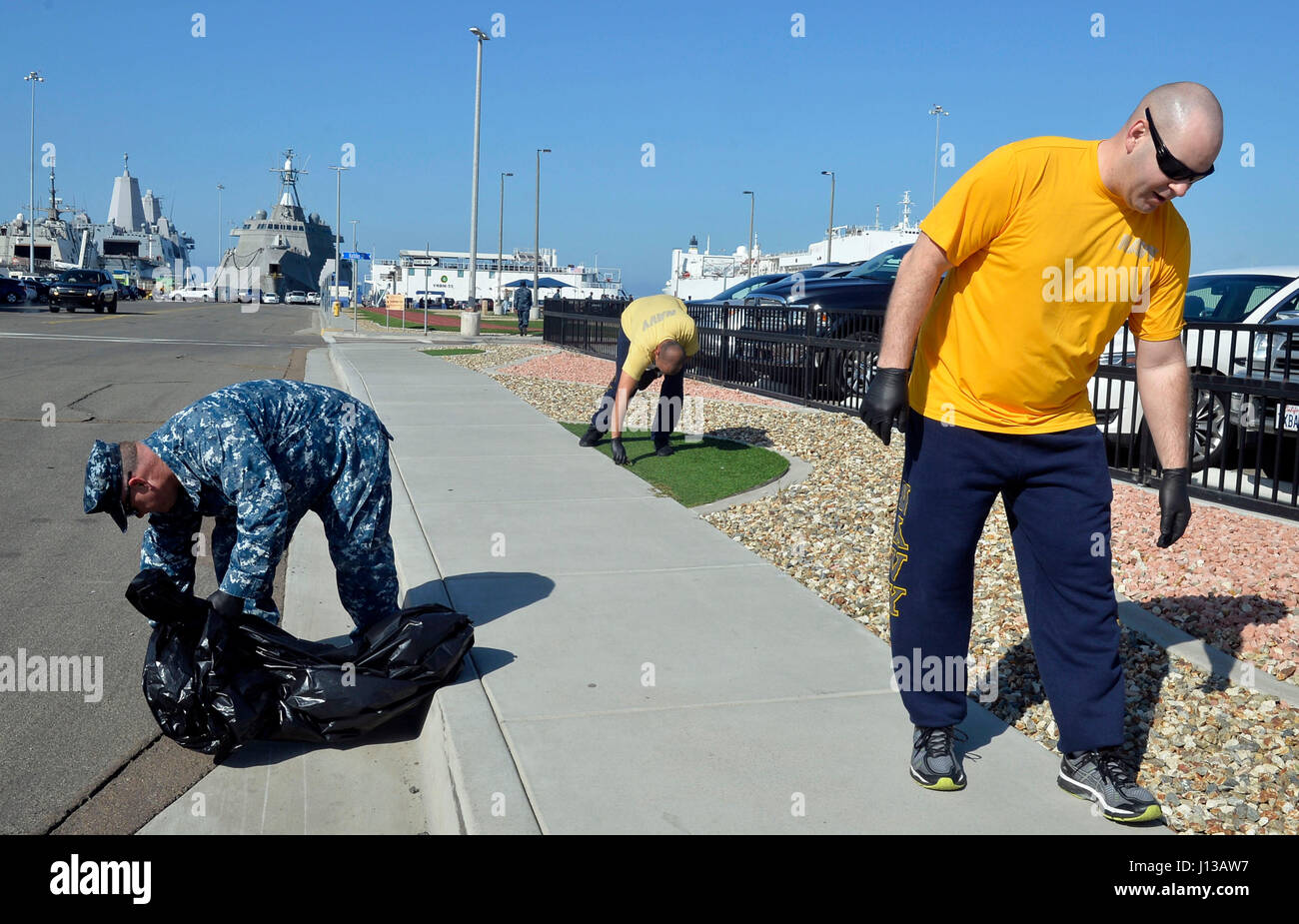 170412-N-IE405-041 SAN DIEGO (April 12, 2017) Sailors from Naval Base San Diego and tenant commands participate in this year’s base cleanup. The all-hands event is hosted by Naval Base San Diego First Class Petty Officer Association in an effort to clean and improve the appearance of the naval base and promote morale. (U.S. Navy photo by Mass Communication Specialist 2nd Class Indra Bosko/Released) Stock Photo