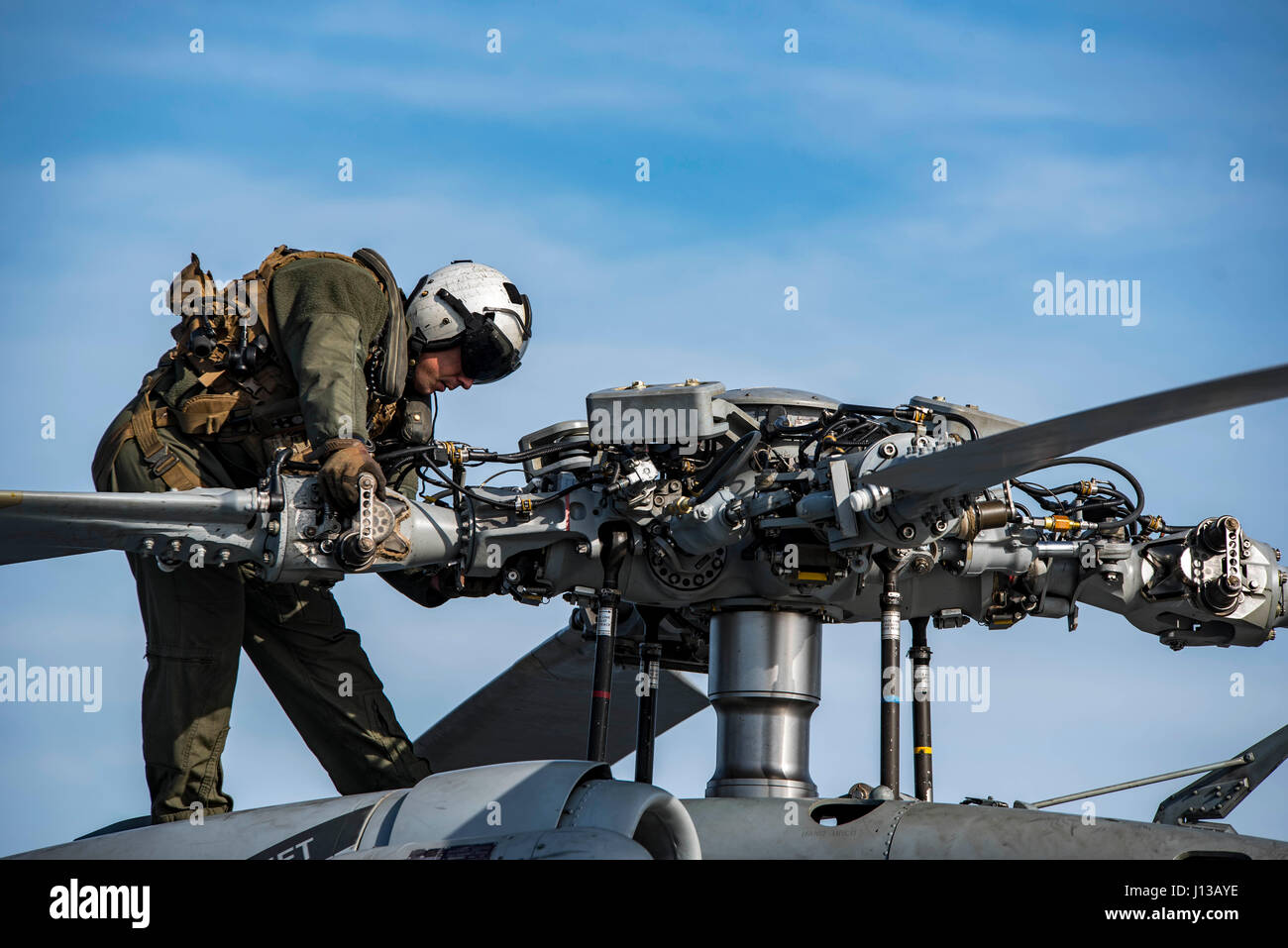Pilot, conducts a pre flight inspection hi-res stock photography and ...