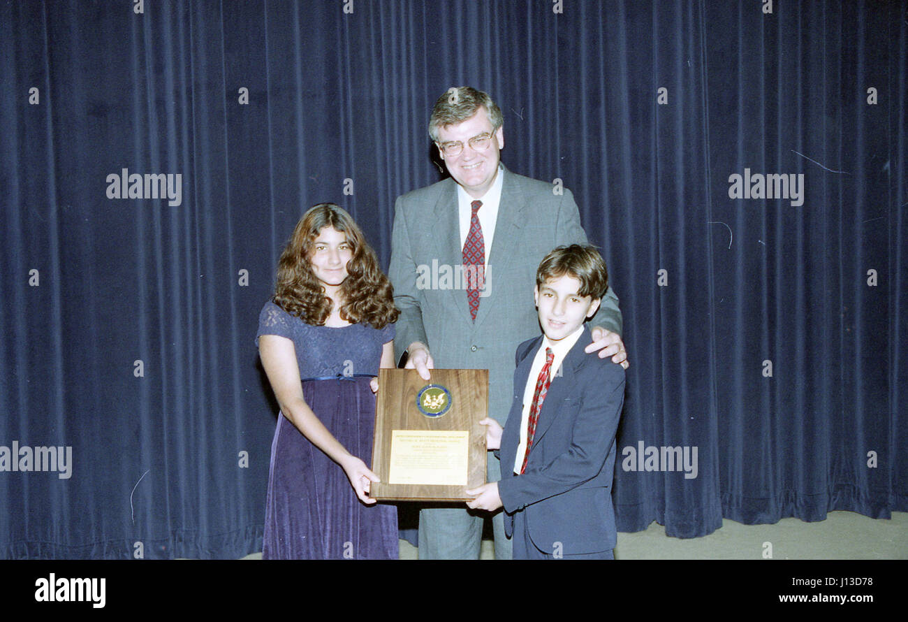 Students receive awards during a formal recognition ceremony ...