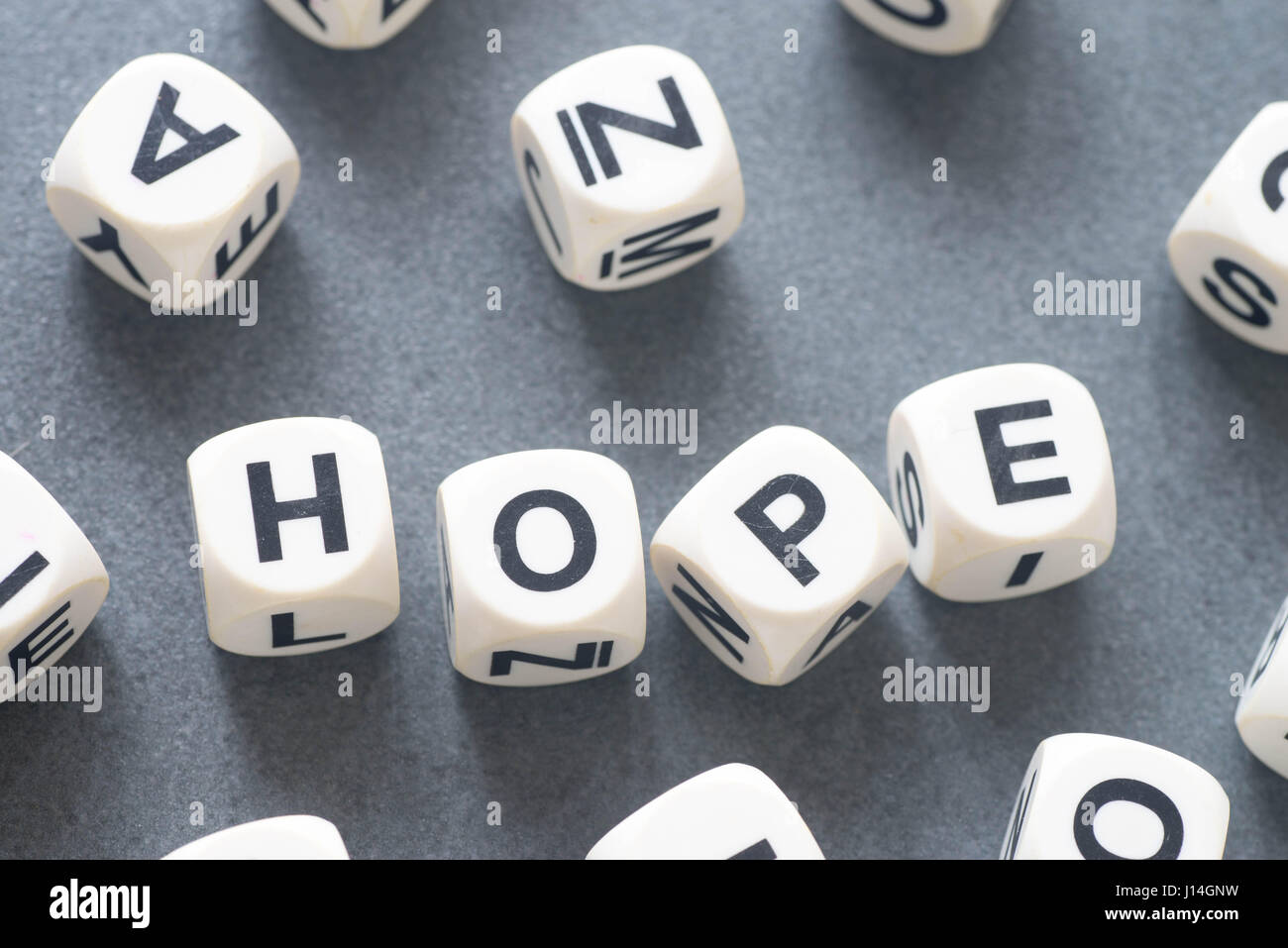 word hope on white toy cubes Stock Photo