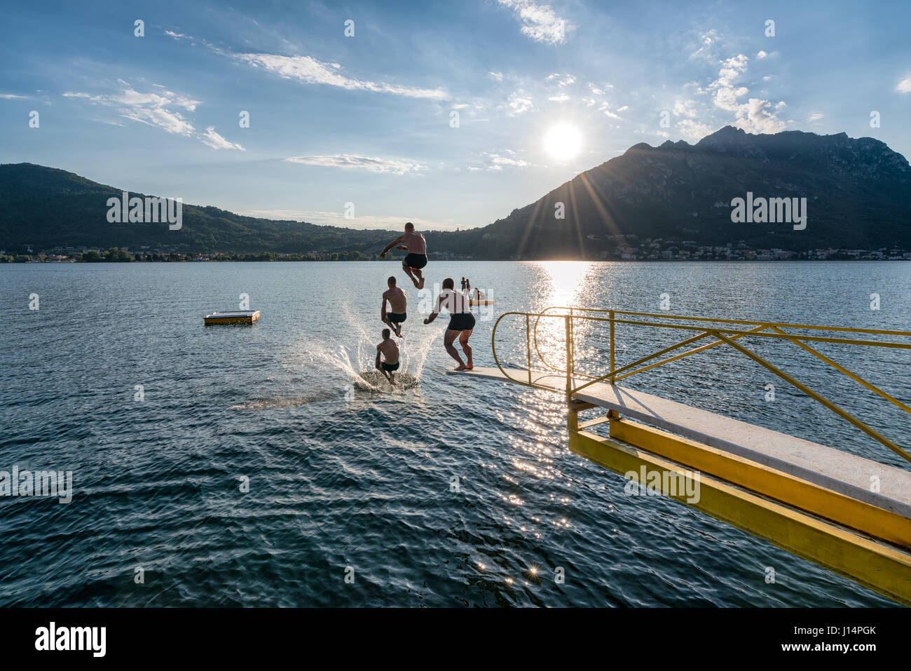 Diving into the Lago di Garlate lake in Lecco, North Italy, Europe, EU Stock Photo