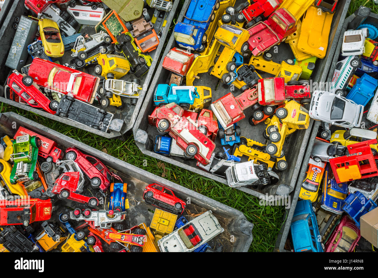 Boxes of toy cars autos on sales in a market Stock Photo