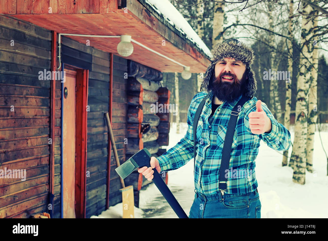 winter man axe wood Stock Photo - Alamy