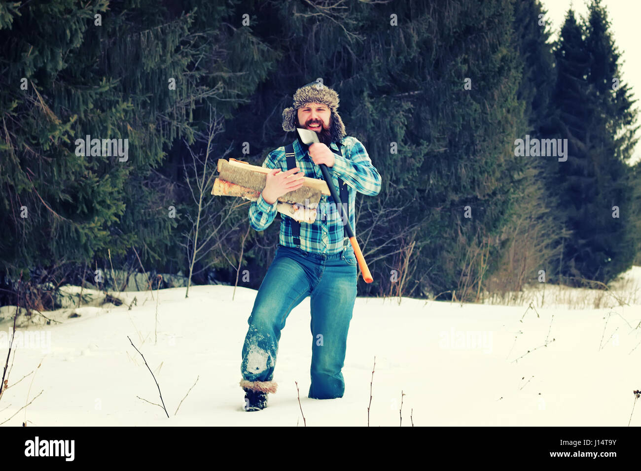 winter man axe wood Stock Photo - Alamy