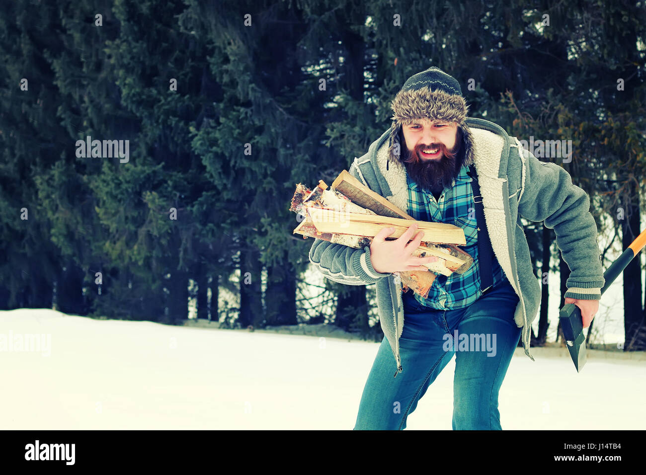 winter man axe wood Stock Photo - Alamy