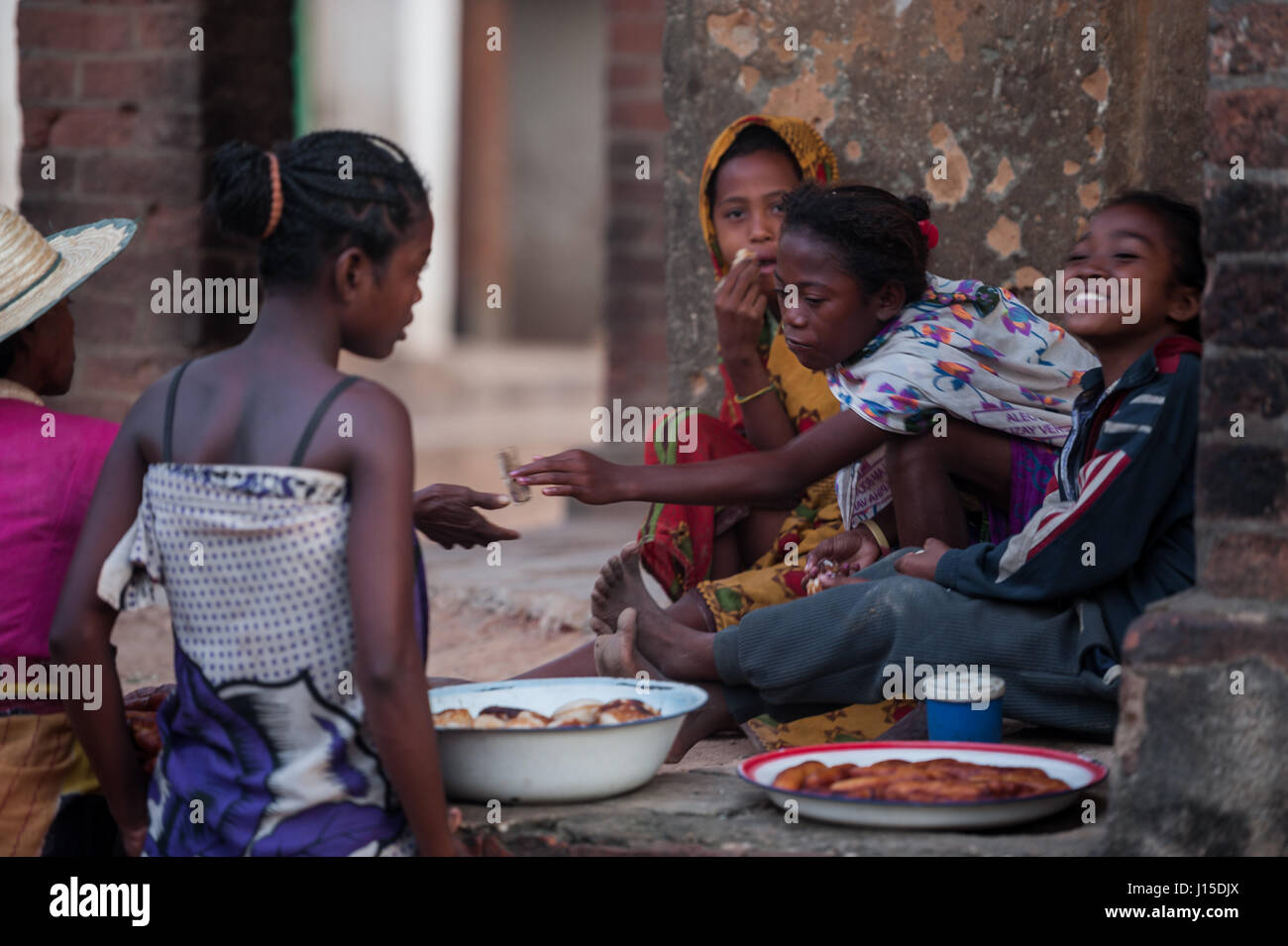Children selling bread on the street in Ankavandra, Madagascar Stock Photo