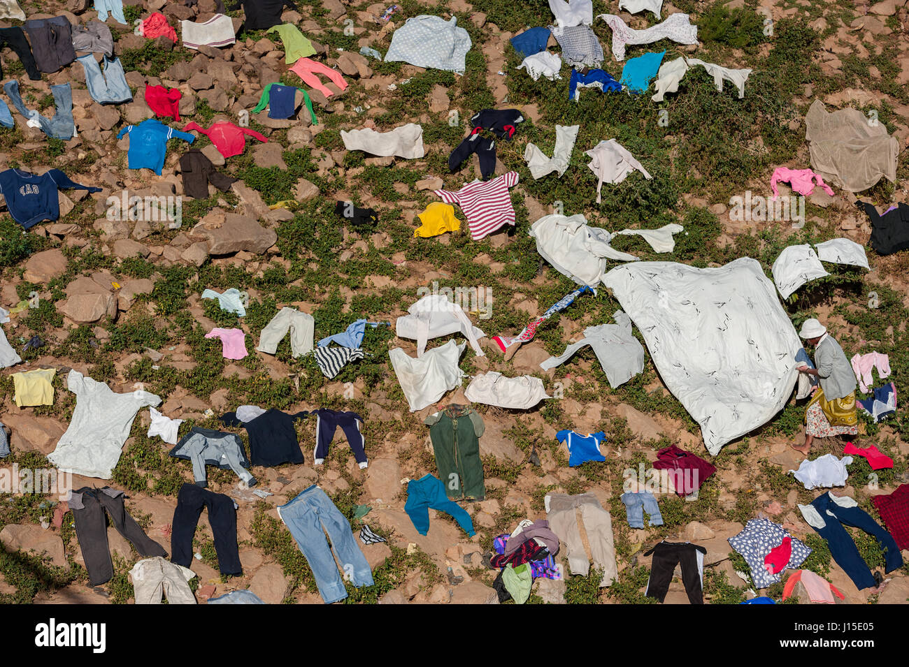 Drying clothes along the banks of the Ikopa River in the Madagascan capital of Antananarivo Stock Photo