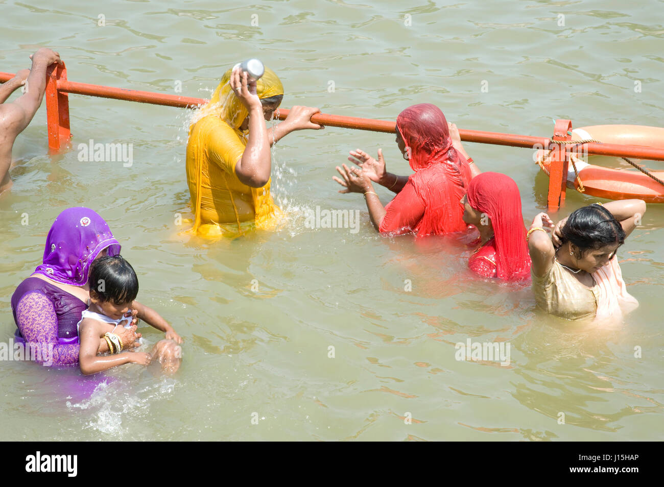Pilgrims taking holy dip in kshipra river, ujjain, madhya pradesh, india, asia Stock Photo
